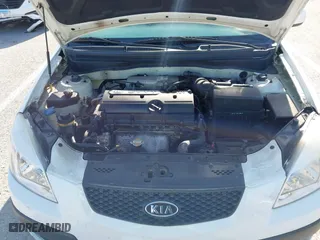 2009 Kia Rio SX with VIN KNADE223696518580, listed as a IAAI auction lot 41990650 with 1 mi miles. Bid and sale history available at carsss.com. Image 10.