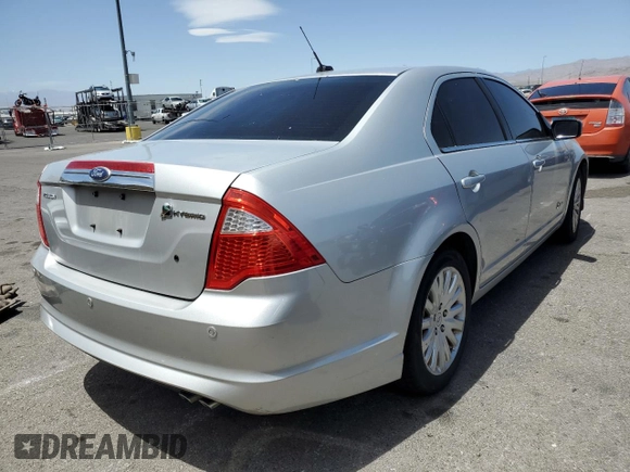 2010 Ford Fusion Hybrid z VIN 3FADP0L39AR273836, wystawiony jako Copart lot #54815095 z przebiegiem 245 960 mil mil oraz Czysty tytuł • Clean title. Historia ofert i sprzedaży dostępna na DreamBid. Obrazek 3.