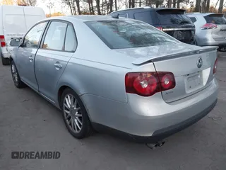 2009 Volkswagen Jetta Wolfsburg Edition with VIN 3VWRJ71K19M027857, listed as a IAAI auction lot 41312413 with 150,335 mi miles and . Bid and sale history available at DreamBid. Image 3.