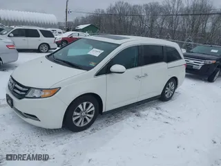 2016 Honda Odyssey EX-L with VIN 5FNRL5H64GB012894, listed as a IAAI auction lot 41256696 with 51,510 mi miles. Bid and sale history available at carsss.com. Image 2.