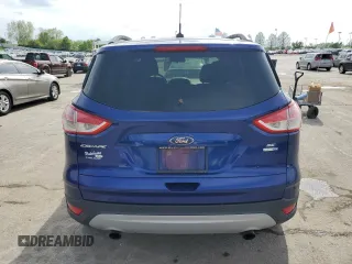 2014 Ford Escape SE z VIN 1FMCU9GX6EUD93636, wystawiony jako Copart lot #54245245 z przebiegiem 146 363 mil mil oraz Czysty tytuł • Clean title. Historia ofert i sprzedaży dostępna na DreamBid. Obrazek 6.