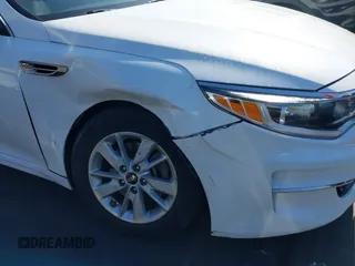 2016 Kia Optima LX z VIN KNAGT4L38G5102885, wystawiony jako IAAI lot #42229044 z przebiegiem 102 416 mil mil oraz . Historia ofert i sprzedaży dostępna na DreamBid. Obrazek 6.