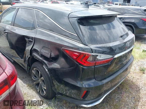 2020 Lexus RX with VIN JTJHZKEA3L2016365, listed as a IAAI auction lot 41615430 with 33,853 mi miles. Bid and sale history available at carsss.com. Image 3.