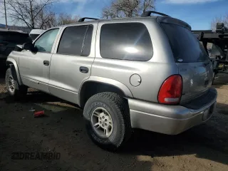 2000 Dodge Durango with VIN 1B4HS28Z6YF255687, listed as a Copart auction lot 84959164 with 189,369 mi miles and Salvage Title. Bid and sale history available at DreamBid. Image 2.