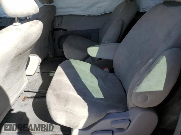 2012 Toyota Sienna with VIN 5TDZK3DC2CS244967, listed as a Copart auction lot 49787795 with 242,667 mi miles and Salvage Title. Bid and sale history available at carsss.com. Image 11.