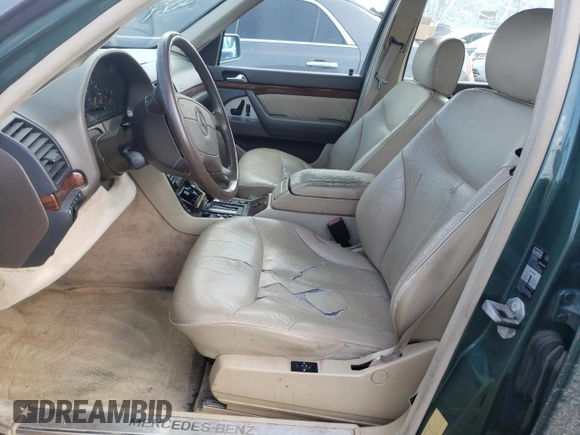 1995 Mercedes-Benz S with VIN WDBGA43E5SA246161, listed as a Copart auction lot 60233354 with 129,774 mi miles and Non Repairable. Bid and sale history available at DreamBid. Image 7.