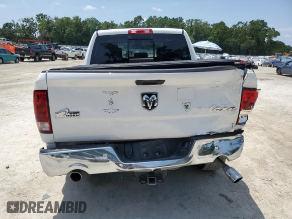 2018 Ram 1500 Big Horn z VIN 1C6RR7LT7JS254698, wystawiony jako Copart lot #57526965 z przebiegiem 46 700 mil mil oraz Szkoda całkowita • Salvage title. Historia ofert i sprzedaży dostępna na DreamBid. Obrazek 6.