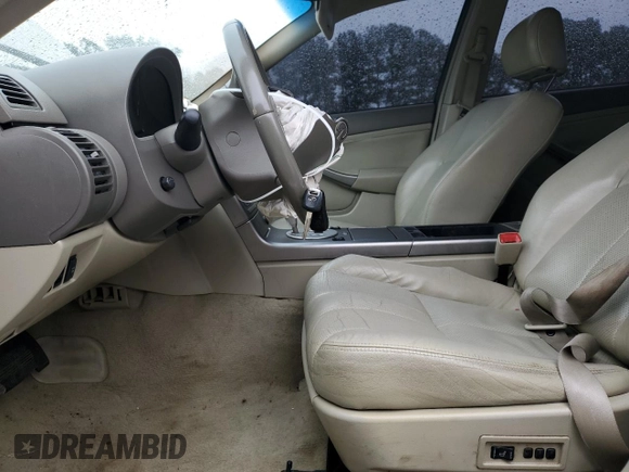 2004 Infiniti G35 w/Leather with VIN JNKCV51E54M613413, listed as a Copart auction lot 71264244 with 206,999 mi miles and Salvage Title. Bid and sale history available at DreamBid. Image 7.