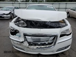 2011 Chrysler 300 Limited z VIN 2C3CA5CG4BH596104, wystawiony jako Copart lot #58193145 z przebiegiem 163 558 mil mil oraz Szkoda całkowita • Salvage title. Historia ofert i sprzedaży dostępna na DreamBid. Obrazek 5.