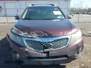 2012 Kia Sorento LX with VIN 5XYKTCA63CG222759, listed as a IAAI auction lot 41815156 with 191,502 mi miles. Bid and sale history available at carsss.com. Image 6.