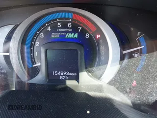 2011 Honda Insight with VIN JHMZE2H3XBS005408, listed as a IAAI auction lot 41747390 with 154,892 mi miles and . Bid and sale history available at DreamBid. Image 7.
