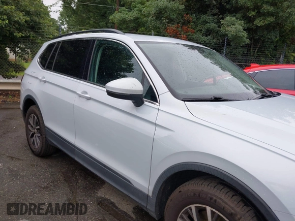 2019 Volkswagen Tiguan SE z VIN 3VV3B7AX7KM029525, wystawiony jako IAAI lot #42631715 z przebiegiem 148 174 mil mil oraz . Historia ofert i sprzedaży dostępna na DreamBid. Obrazek 13.
