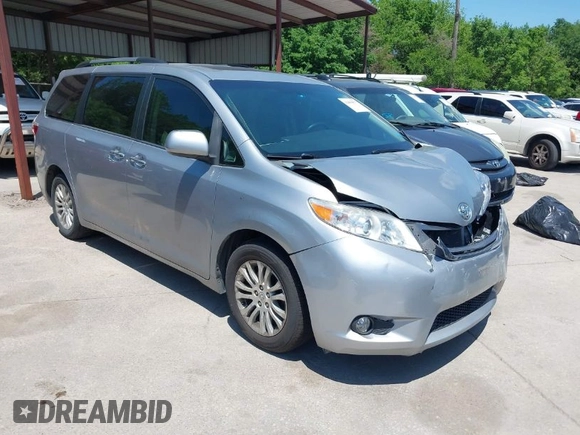 2015 Toyota Sienna XLE with VIN 5TDYK3DC0FS555636, listed as a IAAI auction lot 42099577 with 114,975 mi miles. Bid and sale history available at carsss.com. Image 1.