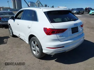 2019 Audi Q3 Premium with VIN WA1AECF37K1077089, listed as a IAAI auction lot 41742732 with 61,038 mi miles and . Bid and sale history available at DreamBid. Image 3.
