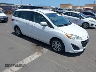 2012 Mazda 5 Sport with VIN JM1CW2BL7C0124897, listed as a IAAI auction lot 42269582 with 230,070 mi miles and . Bid and sale history available at DreamBid. Image 1.