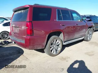 2016 Chevrolet Tahoe LTZ z VIN 1GNSKCKC9GR205745, wystawiony jako IAAI lot #41710241 z przebiegiem 94 931 mil mil oraz . Historia ofert i sprzedaży dostępna na DreamBid. Obrazek 4.