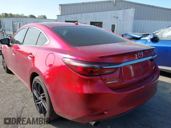 2018 Mazda 6 Grand Touring Reserve with VIN JM1GL1WY9J1308966, listed as a IAAI auction lot 41928044 with 113,488 mi miles and . Bid and sale history available at DreamBid. Image 3.