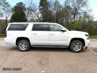 2015 Chevrolet Suburban LT with VIN 1GNSCJKC6FR229260, listed as a IAAI auction lot 41974363 with 251,395 mi miles. Bid and sale history available at carsss.com. Image 13.