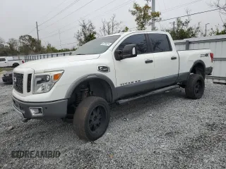 2017 Nissan Titan XD SL with VIN 1N6BA1F43HN544218, listed as a Copart auction lot 85758614 with 124,765 mi miles and Salvage Title. Bid and sale history available at carsss.com. Image 1.