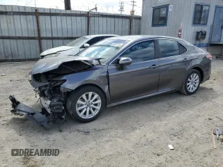 2018 Toyota Camry LE с VIN 4T1B11HK9JU051391, выставлен на аукционе Copart как лот 56680735 с пробегом 113 376 миль миль и Списание • Salvage title. История ставок и продаж доступна на DreamBid. Изображение 1.