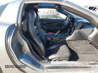 2004 Chevrolet Corvette with VIN 1G1YY22G445114652, listed as a IAAI auction lot 41614337 with 101,983 mi miles and . Bid and sale history available at DreamBid. Image 5.
