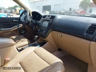 2006 Acura MDX Touring w/Navi with VIN 2HNYD18886H530531, listed as a IAAI auction lot 42045364 with 174,528 mi miles. Bid and sale history available at carsss.com. Image 5.