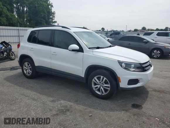 2017 Volkswagen Tiguan S with VIN WVGAV7AX7HK017576, listed as a Copart auction lot 58487455 with 100,034 mi miles and Salvage title. Bid and sale history available at DreamBid. Image 4.