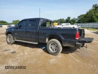 2003 Ford Super Duty F-250 XL with VIN 1FTNW21P73EC67848, listed as a Copart auction lot 64401394 with 146,307 mi miles and Salvage Title. Bid and sale history available at carsss.com. Image 2.
