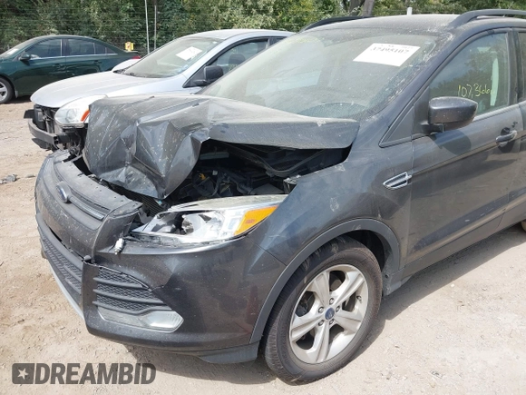 2016 Ford Escape SE with VIN 1FMCU9G99GUA33121, listed as a IAAI auction lot 37495107 with 107,366 mi miles. Bid and sale history available at carsss.com. Image 12.