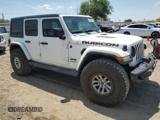 2018 Jeep Wrangler Unlimited Rubicon with VIN 1C4HJXFG9JW308991, listed as a Copart auction lot 53638955 with 95,508 mi miles and Salvage title. Bid and sale history available at DreamBid. Image 4.