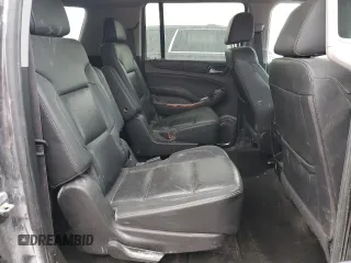 2017 Chevrolet Suburban Premier z VIN 1GNSKJKCXHR403076, wystawiony jako Copart lot #46606025 z przebiegiem 99 481 mil mil oraz Szkoda całkowita • Salvage title. Historia ofert i sprzedaży dostępna na DreamBid. Obrazek 11.