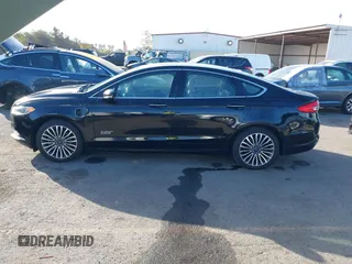 2017 Ford Fusion Energi SE with VIN 3FA6P0PU0HR129792, listed as a IAAI auction lot 41104376 with 86,659 mi miles. Bid and sale history available at carsss.com. Image 14.