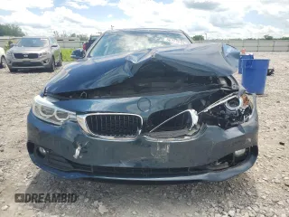 2015 BMW 4 Series 428i z VIN WBA3N3C5XFK232705, wystawiony jako Copart lot #56327515 z przebiegiem 102 089 mil mil oraz Szkoda całkowita • Salvage title. Historia ofert i sprzedaży dostępna na DreamBid. Obrazek 5.