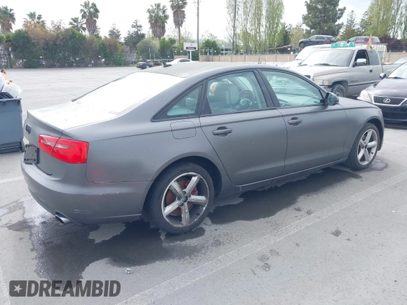 2013 Audi A6 2.0T Premium with VIN WAUCFAFC3DN043093, listed as a IAAI auction lot 42043576 with 136,592 mi miles. Bid and sale history available at carsss.com. Image 4.
