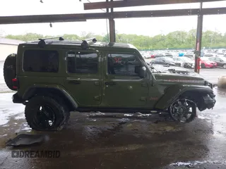 2021 Jeep Wrangler Unlimited Rubicon with VIN 1C4HJXFG4MW543254, listed as a IAAI auction lot 42316180 with 50,696 mi miles and . Bid and sale history available at DreamBid. Image 13.