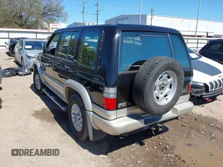 2002 Isuzu Trooper S with VIN JACDS58X227J00202, listed as a IAAI auction lot 41717506 with 164,206 mi miles and . Bid and sale history available at DreamBid. Image 3.