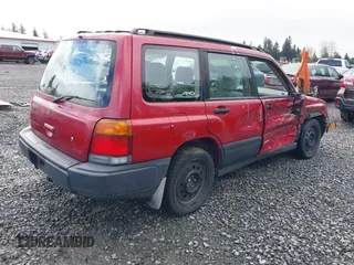 1999 Subaru Forester L with VIN JF1SF6357XH748358, listed as a IAAI auction lot 41885337 with 201,441 mi miles. Bid and sale history available at carsss.com. Image 4.