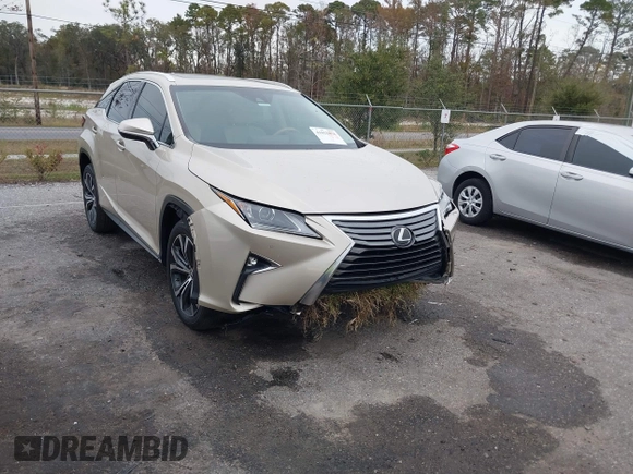 2018 Lexus RX with VIN 2T2ZZMCA9JC099803, listed as a IAAI auction lot 41052078 with 32,423 mi miles. Bid and sale history available at carsss.com. Image 1.