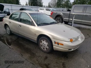 2001 Saturn SL z VIN 1G8ZH52851Z286886, wystawiony jako Copart lot #84883824 z przebiegiem Nie podano mil oraz Szkoda całkowita • Salvage title. Historia ofert i sprzedaży dostępna na DreamBid. Obrazek 4.