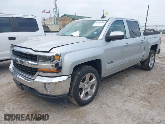 2018 Chevrolet Silverado 1500 LT with VIN 3GCPCREC8JG645232, listed as a IAAI auction lot 41927715 with 95,601 mi miles and . Bid and sale history available at DreamBid. Image 2.