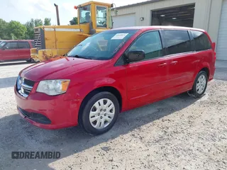 2014 Dodge Grand Caravan American Value with VIN 2C4RDGBG6ER309449, listed as a IAAI auction lot 42148824 with 198,532 mi miles and . Bid and sale history available at DreamBid. Image 2.