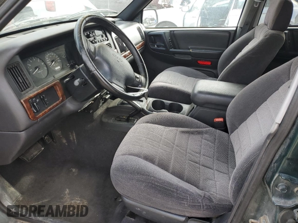 1998 Jeep Grand Cherokee Laredo with VIN 1J4GZ58S5WC285562, listed as a Copart auction lot 89204135 with 0 mi miles and Salvage Title. Bid and sale history available at carsss.com. Image 7.