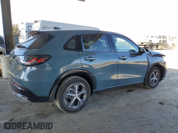 2025 Honda HR-V EX-L with VIN 3CZRZ1H71SM714007, listed as a Copart auction lot 50910245 with 1,239 mi miles and Salvage Title. Bid and sale history available at carsss.com. Image 3.