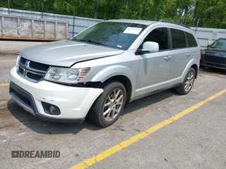 2012 Dodge Journey SXT with VIN 3C4PDDBG1CT249368, listed as a IAAI auction lot 42412217 with 151,680 mi miles and . Bid and sale history available at DreamBid. Image 2.