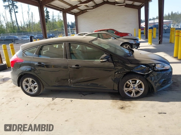 2013 Ford Focus SE with VIN 1FADP3K22DL189998, listed as a IAAI auction lot 42101141 with 116,170 mi miles and . Bid and sale history available at DreamBid. Image 14.