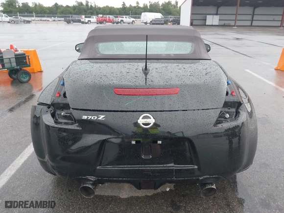2010 Nissan 370Z Touring with VIN JN1AZ4FH7AM304809, listed as a IAAI auction lot 39876962 with 66,418 mi miles. Bid and sale history available at carsss.com. Image 6.