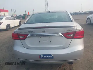 2018 Nissan Maxima SV z VIN 1N4AA6AP1JC366927, wystawiony jako IAAI lot #42394242 z przebiegiem 89 093 mil mil oraz . Historia ofert i sprzedaży dostępna na DreamBid. Obrazek 17.