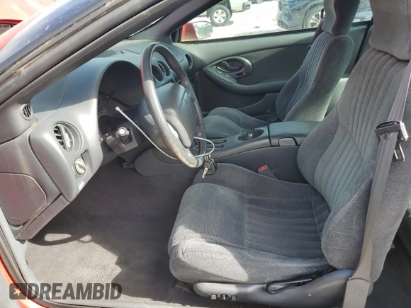 1999 Pontiac Firebird Firebird с VIN 2G2FS22K2X2213687, выставлен на аукционе Copart как лот 65068475 с пробегом 67 341 миль миль и Чистый • Clean title. История ставок и продаж доступна на DreamBid. Изображение 7.