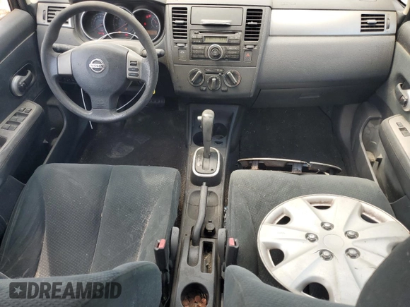 2010 Nissan Versa S with VIN 3N1BC1AP0AL409740, listed as a Copart auction lot 48996685 with 136,924 mi miles and Salvage Title. Bid and sale history available at DreamBid. Image 8.