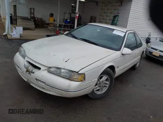 1997 Ford Thunderbird LX with VIN 1FALP62W6VH124267, listed as a IAAI auction lot 41439934 with 242,914 mi miles and . Bid and sale history available at DreamBid. Image 2.